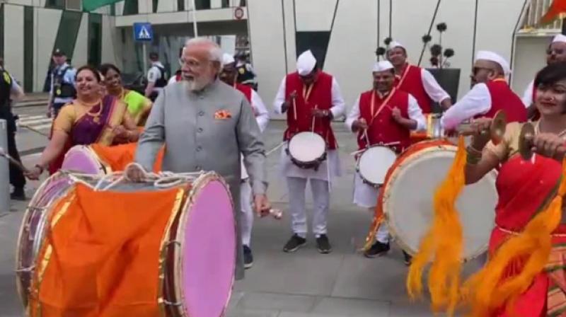 PM Modi tries his hand on a drum in denmark