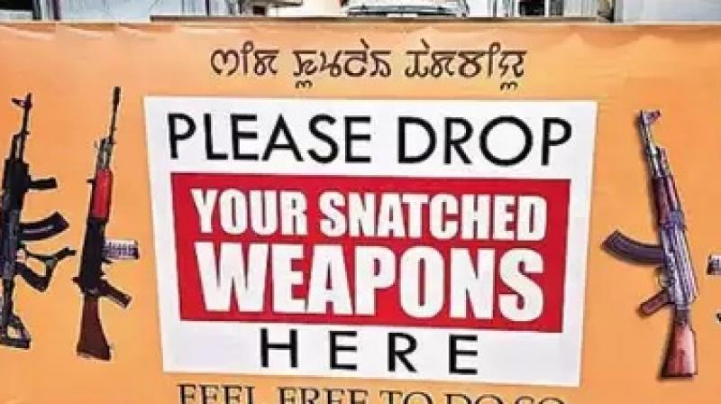 Poster ourside MLA house.