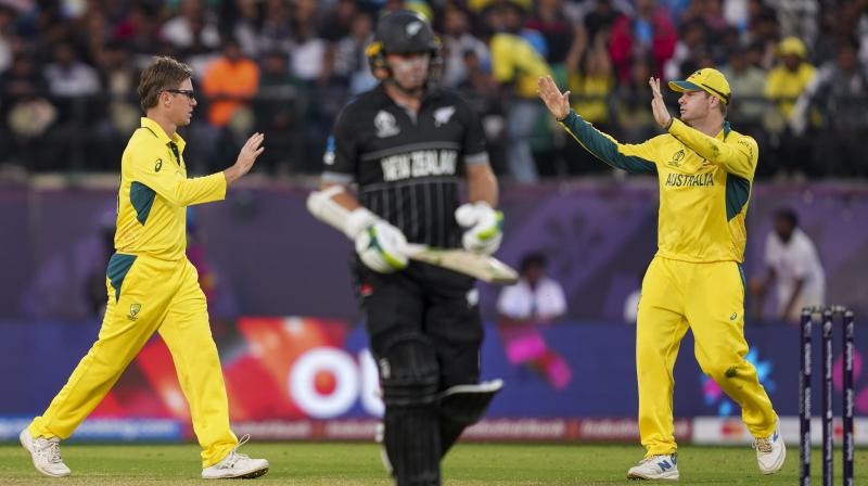 Dharamshala: Australia's Adam Zampa celebrates after taking the wicket of New Zealand's Tom Latham during the ICC Men’s Cricket World Cup 2023 match between Australia and New Zealand, at HPCA Stadium, in Dharamshala, Saturday, Oct. 28, 2023. (PTI Photo/Ravi Choudhary)