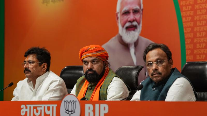 New Delhi: BJP National General Secretary Vinod Tawde with Bihar BJP President Samrat Choudhary addresses a press conference, in New Delhi, Monday, March 18, 2024. (PTI Photo/Atul Yadav)