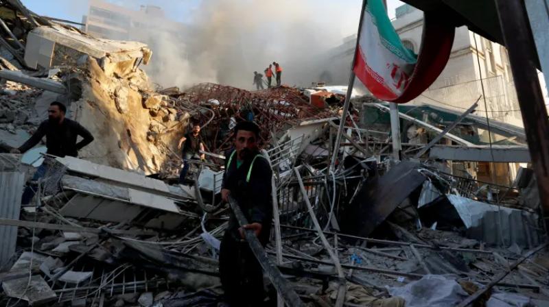 Emergency services work at the consulate building.