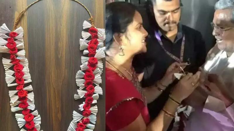 The student presented a garland made of free bus tickets to Chief Minister Siddaramaiah