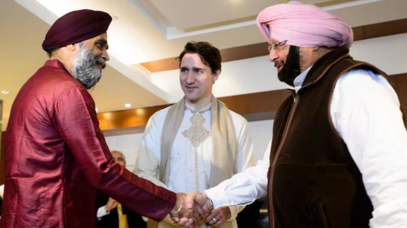 Capt. Amrinder Singh with Harjit Sajjan and Justin Trudeau
