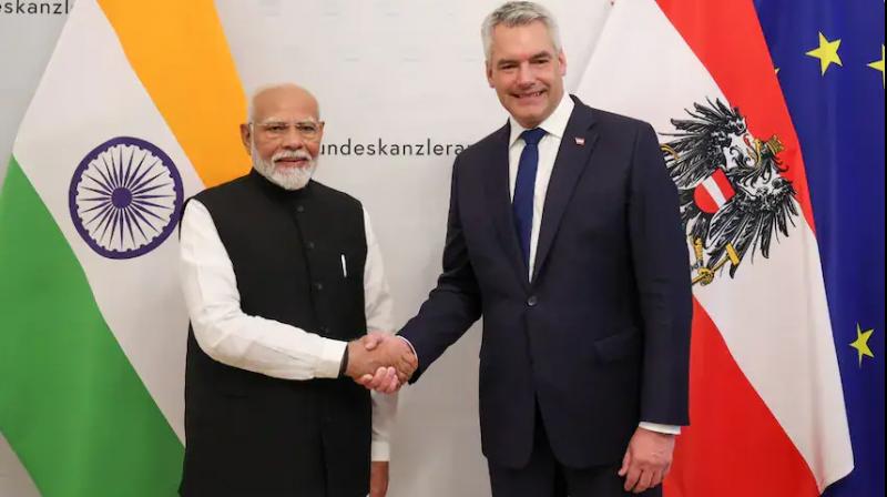  Prime Minister Modi with Austrian Chancellor Karl Nehammer.