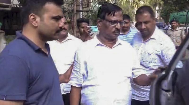 Dharwad: Union Minister Pralhad Joshi's brother Gopal Joshi being arrested by the police at Hubballi based on a cheating complaint lodged by a former JD(S) MLA's wife, in Dharwad district, Karnataka, Saturday, Oct. 19, 2024. (PTI Photo) 