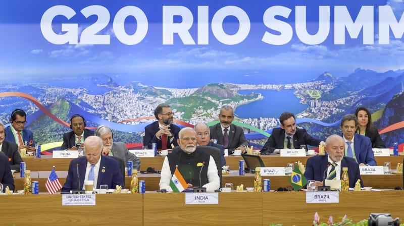 Rio de Janeiro: Prime Minister Narendra Modi with US President Joe Biden, President of Brazil Luiz Inacio Lula da Silva, Chinese President Xi Jinping, French President Emmanuel Macron and South African President Cyril Ramaphosa during the G20 Summit, in Rio de Janeiro, Brazil, Monday, Nov. 18, 2024. (PTI Photo)