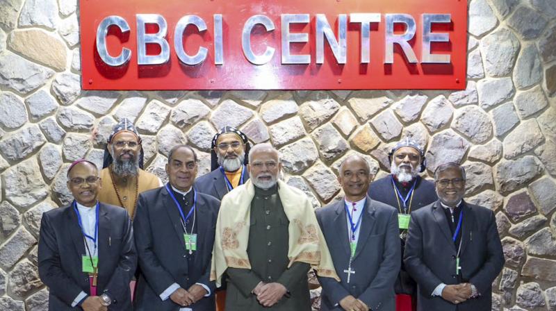 New Delhi: Prime Minister Narendra Modi poses for picture with Archbishops, Bishops and members of Catholic Bishops' Conference of India (CBCI) during Christmas celebrations hosted by the CBCI, in New Delhi, Monday, Dec. 23, 2024. (PTI Photo)