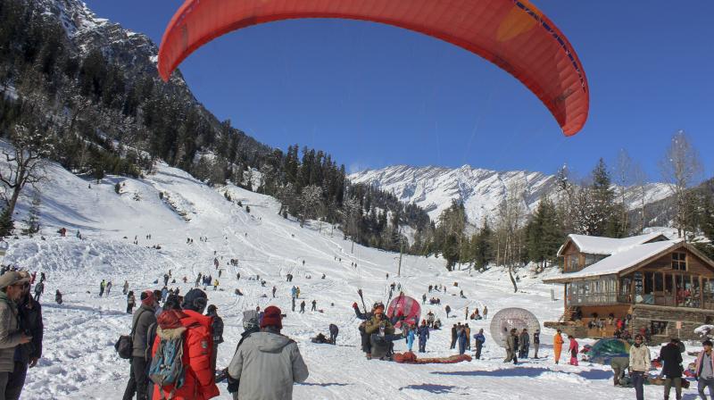 Manali: Tourists at the Solang Nala after fresh snowfall, in Manali, Sunday, Dec. 29, 2024. (PTI Photo)
