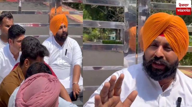 Punjab Education Minister Harjot Singh Bains and Aam Aadmi Party leaders staging a protest image.