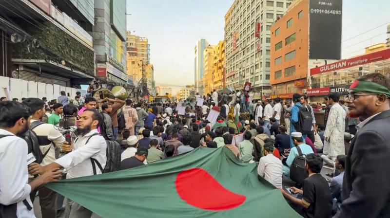 Dhaka: Bangladeshi groups gather for a march following the MEA's summoning of the Bangladesh High Commissioner over a threat to the Indian mission, in Dhaka, Bangladesh, Wednesday, Dec. 17, 2025. (PTI Photo)