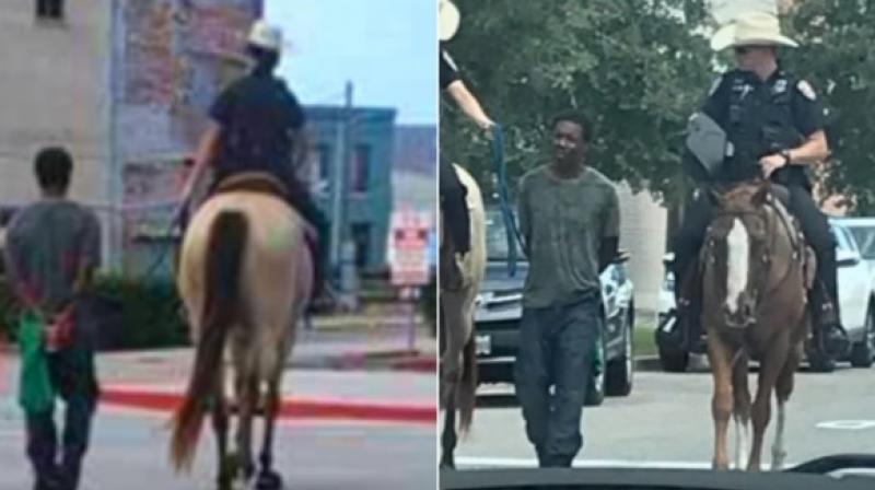 Black man led by mounted police while bound with a rope sues Texas city for $1 million