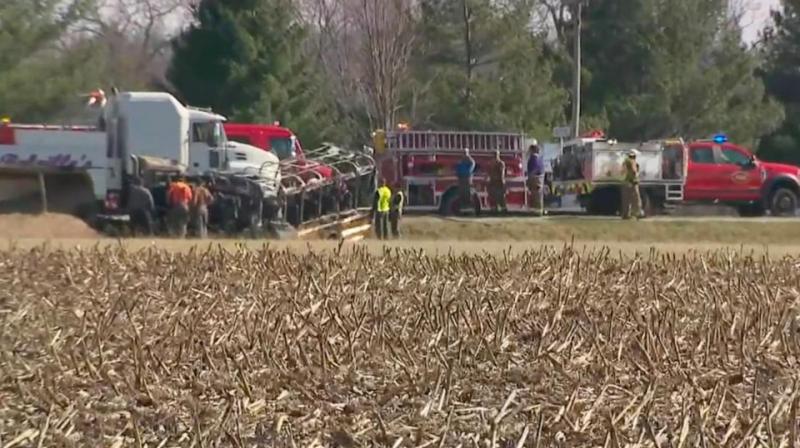 3 children, 2 adults dead after school bus and semitruck collide
