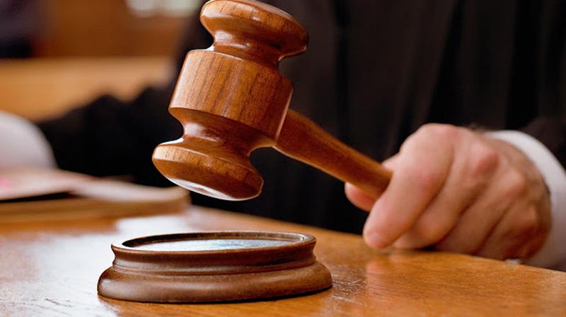 Sitting on woman's cot in dead of night would amount to outraging modesty,