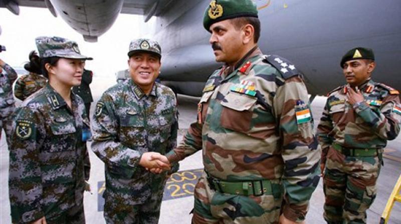 ਭਾਰਤੀ ਤੇ ਚੀਨੀ ਫ਼ੌਜਾਂ ਦੇ ਅਧਿਕਾਰੀ।