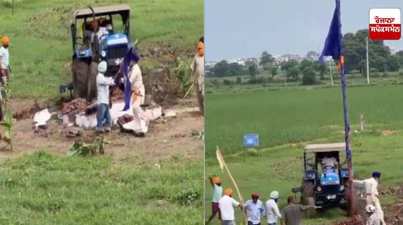 ਨਿਸ਼ਾਨ ਸਾਹਿਬ ਨੂੰ ਟਰੈਕਟਰ ਦੀ ਮਦਦ ਨਾਲ ਉਤਾਰਿਆ ਹੋਏ ਤਸਵੀਰ 