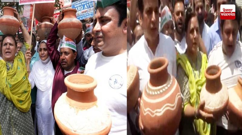 Matka phod protest against aap in delhi over water crisis