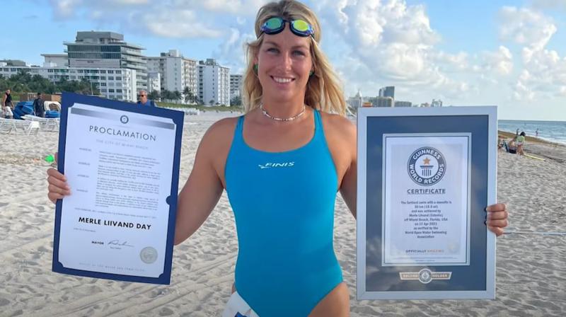 Florida swimmer collects trash while breaking world record