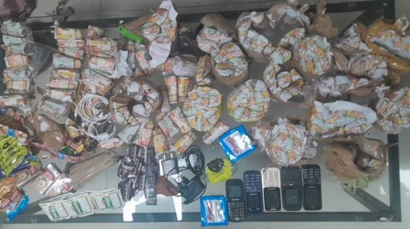 Amritsar police recovered mobile phones, chargers, heater springs and large quantities of beedis, cigarettes and other drugs.