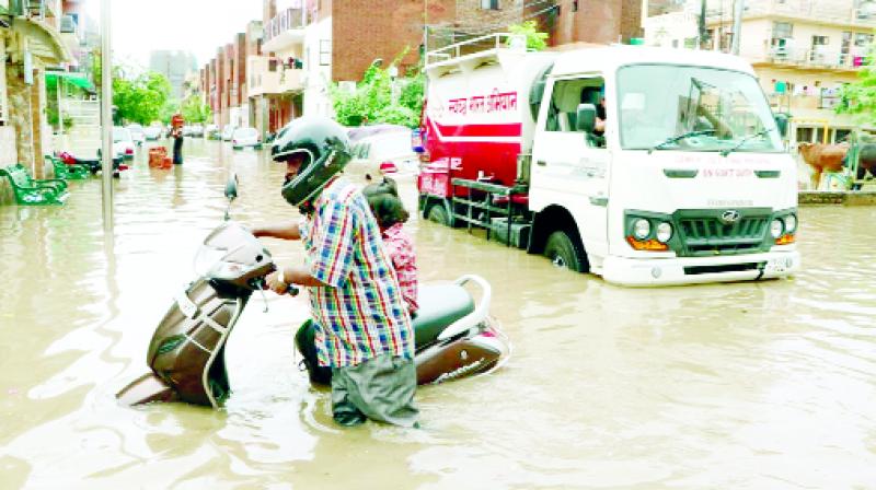 Vehicles passing through the Rainy water