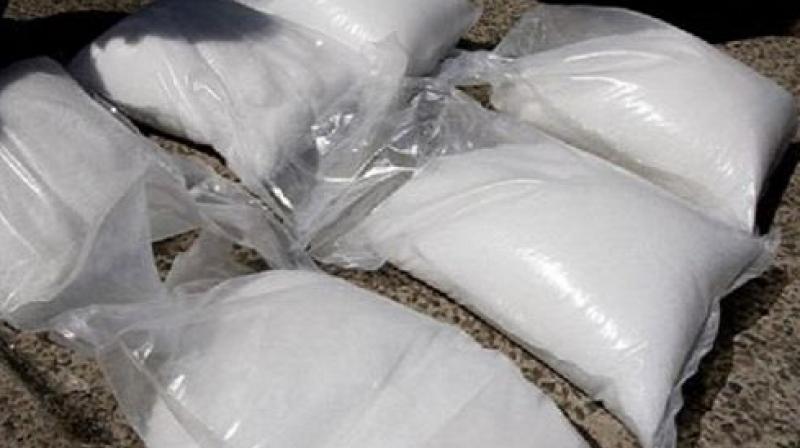  5 kg of 650 grams heroin & 2 Pak SIM