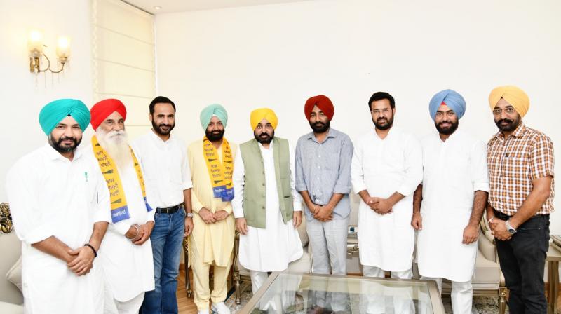 Congress leader and Barnal MC president Gurjit Singh Ramanvasia and social worker Kulwant Singh join AAP