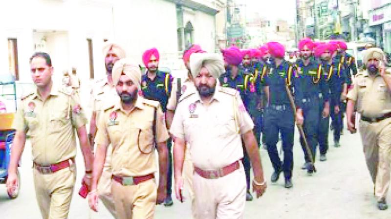 Police officers during the Flag March