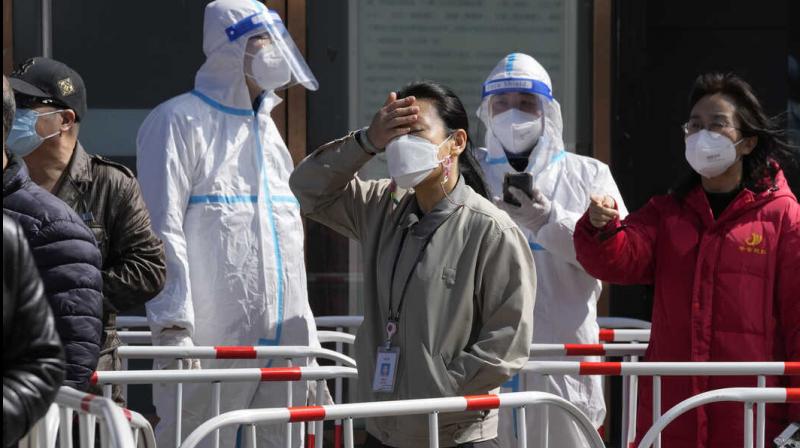 China battles multiple outbreaks driven by 'stealth Omicron'