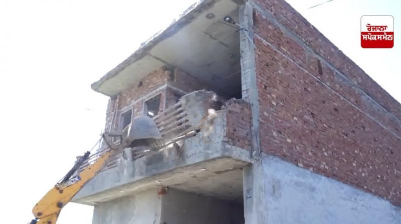 Bulldozer runs over two-storey building of drug smuggler in Amritsar