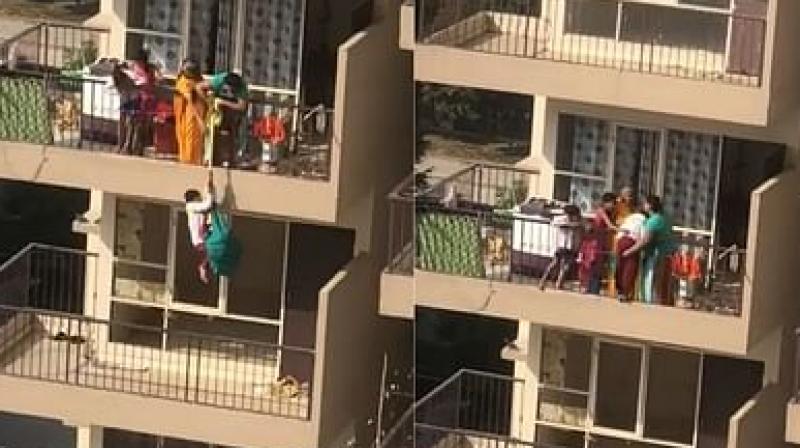 Mother hangs son from 10th floor balcony by saree