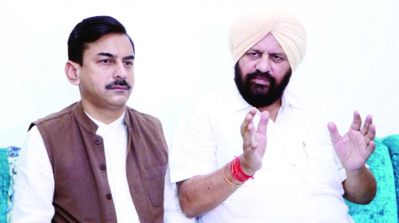 Harjit Singh Grewal and Vineet Joshi Talking to Media