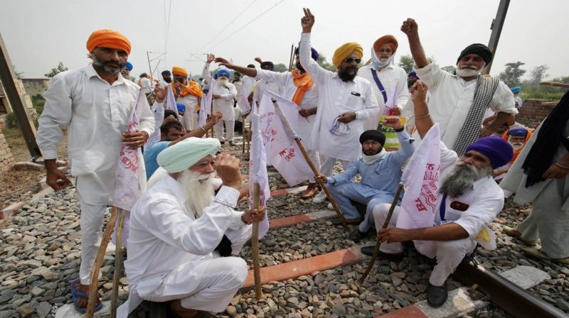 Farmers protest on railway track