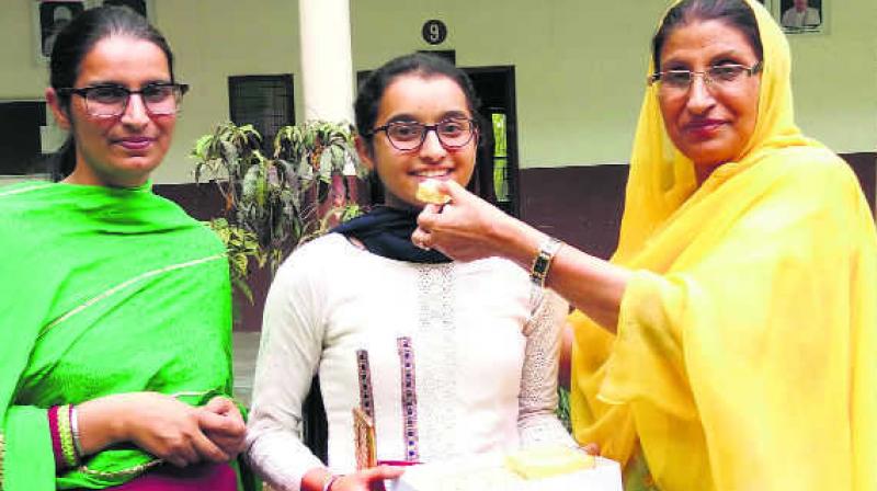 Farmer’s daughter tops district