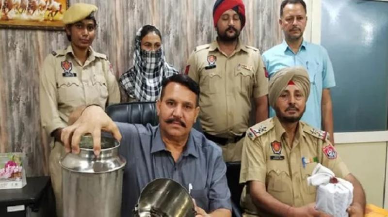  700 grams of opium was found in a dollu of desi ghee