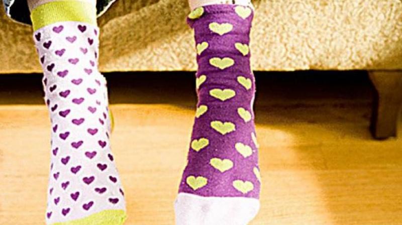  Why are wearing missmached sockes on March 21?