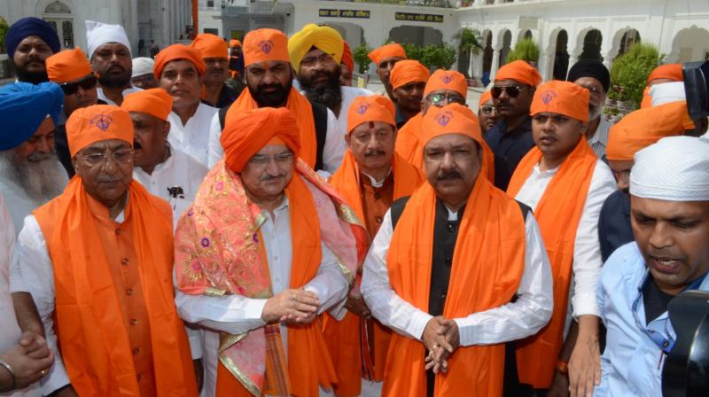 J.P. Nadda bowed down at Gurudwara Patna Sahib wearing a turban