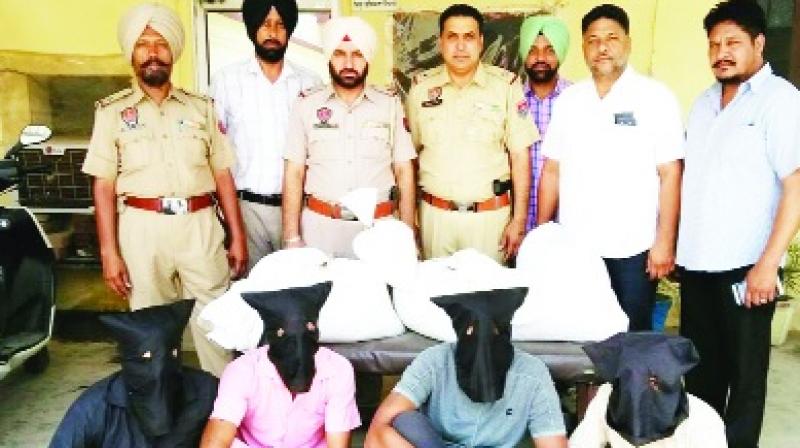 Police with 3 Arrested Accused