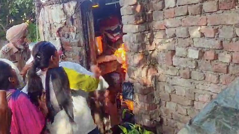 Opposing civic body action, two brothers set themselves ablaze