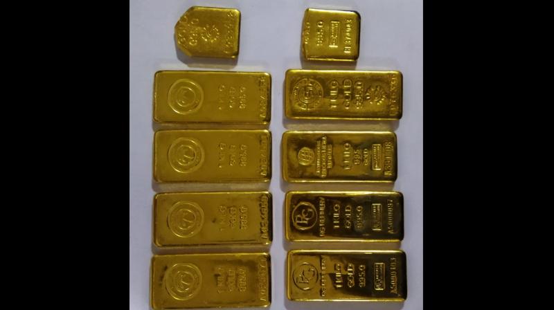 customs department recovered about 9000 grams of gold from a passenger 