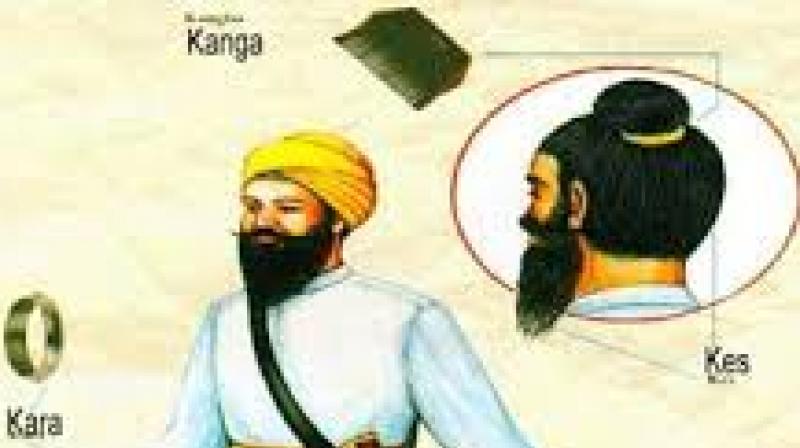 Cut off the beard of an Amritdhari Sikh