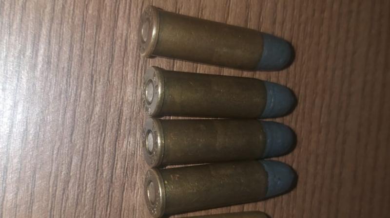  Four live cartridges of 32 bore were recovered from an NRI going to Pakistan