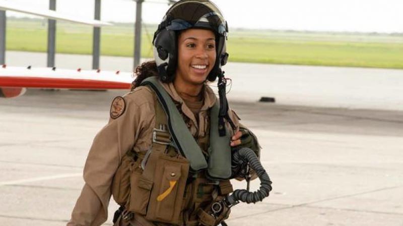 Became the first non-white female pilot in a US Navy fighter jet