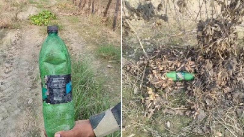 BSF troops recovered one bottle filled with suspected heroin