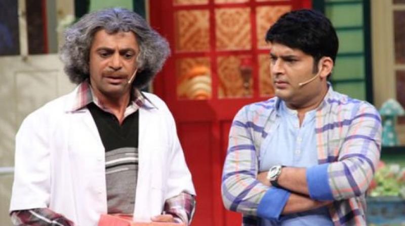 Sunil with Kapil 