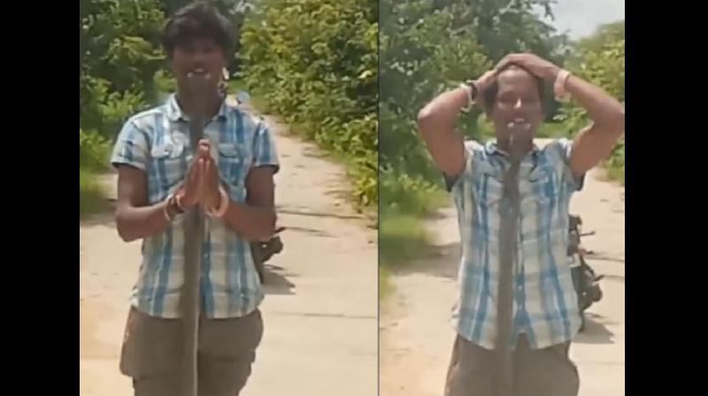 Telangana boy put head of Cobra inside Mouth