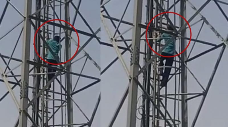  Young man climbs tower for release of bandi singh and justice for guru granth sahib disrespect 