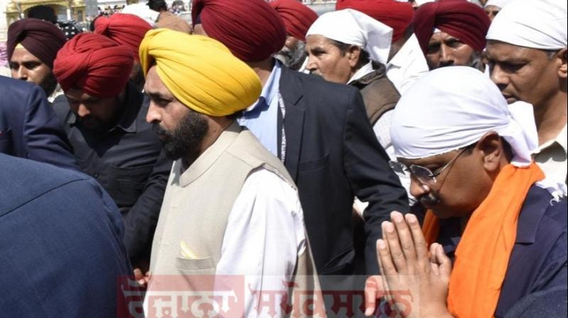 Bhagwant Mann and Kejriwal pay homage at Golden Temple after historic victory in elections