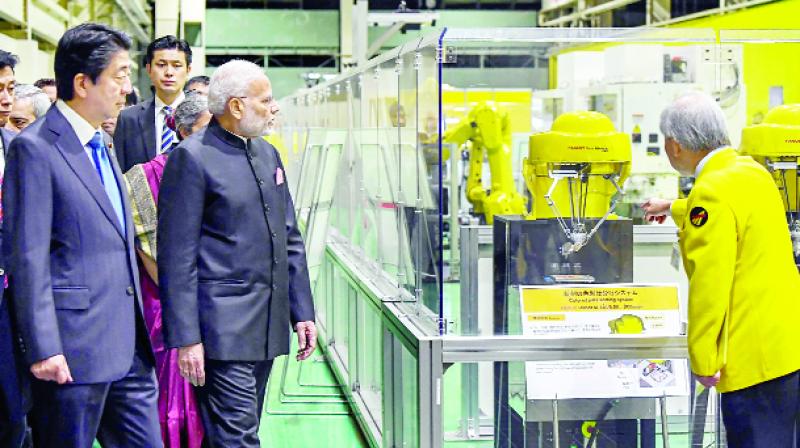 While visiting the industrial robot factory