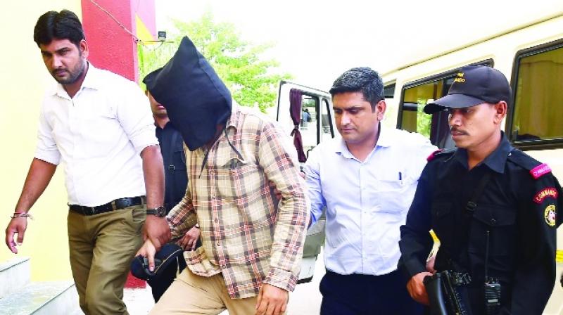 Ahmad  Lambu Taken By Police