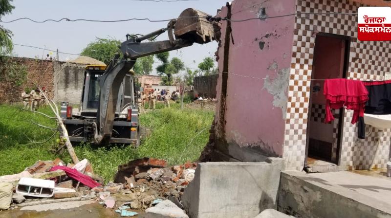 Ditch machine used on illegal construction done by drug smugglers on panchayat lands