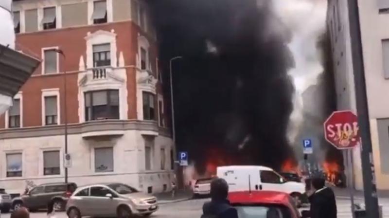 Explosion in centre of Milan leaves several vehicles on fire